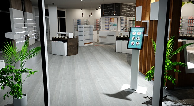 A kiosk equipped with innovative technology stands in a spacious pharmacy.