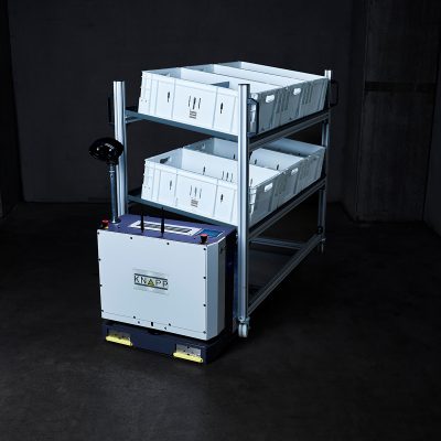 KNAPP_Open_Shuttle_Fork_AGV_FTS_Sonderladungsträger Con el Open Shuttle Fork se pueden transportar diversos montacargas especiales como una estructura de estantería.