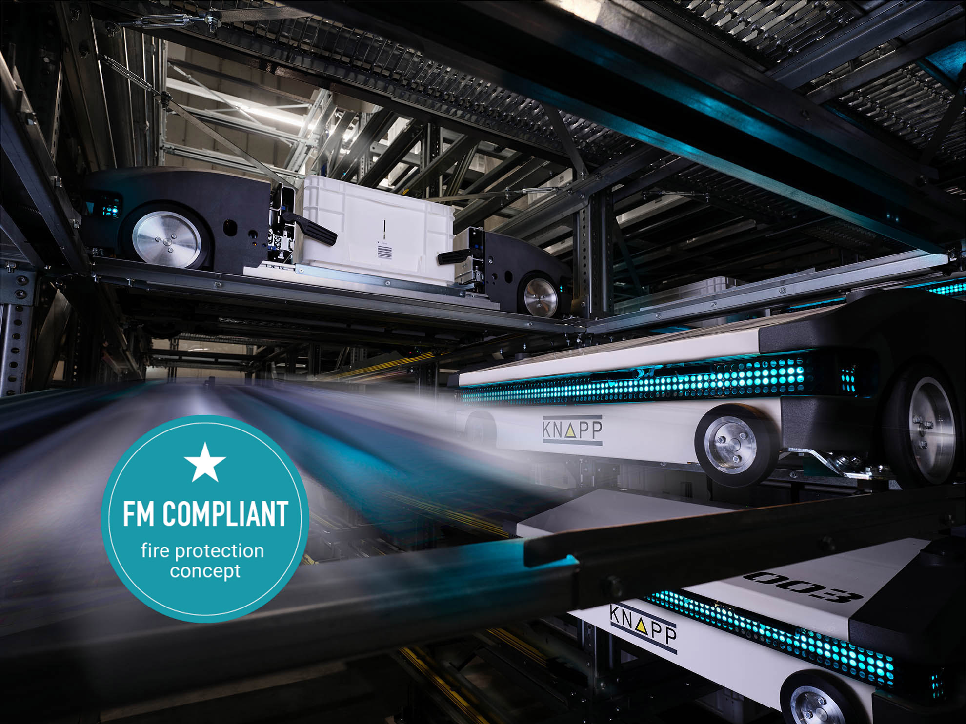 evo-shuttle-2d-moving_fm-global-1 Automatisiertes Lagersystem mit KNAPP-Robotern, die Waren transportieren, FM Global Compliant Brandschutzkonzept.