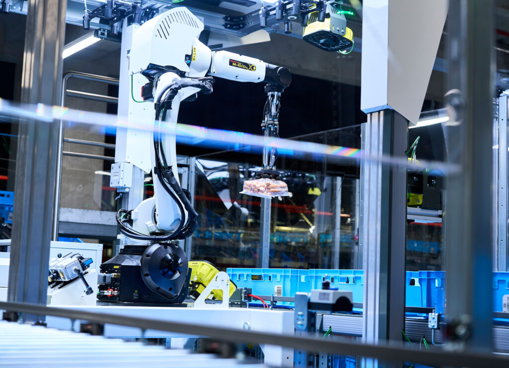 EDEKA expands warehouse automation solution with robots featuring AI by KNAPP
